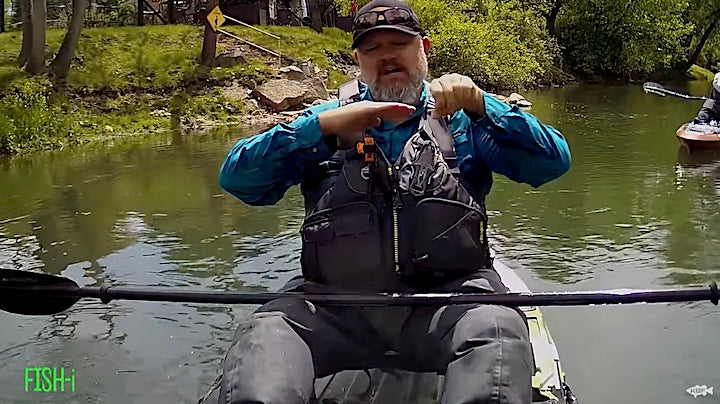 River fishing in a kayak