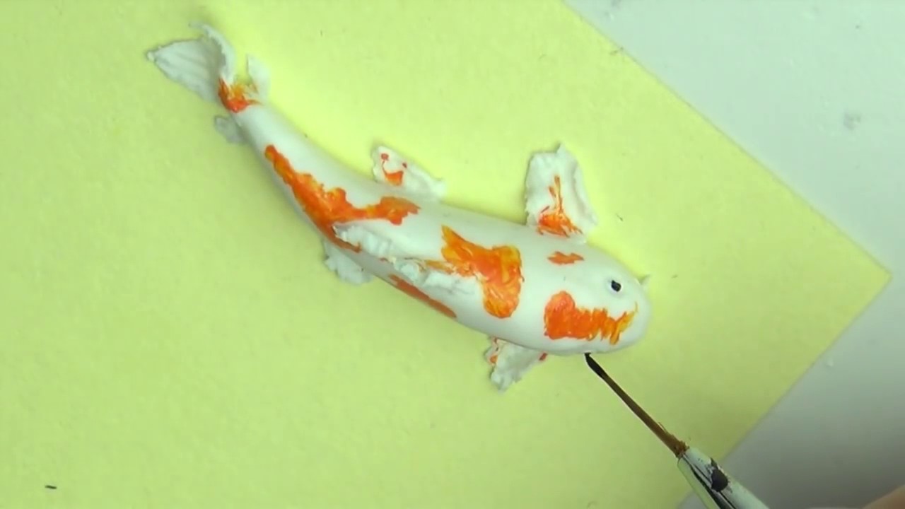 The Different Styles and Designs of Koi Fish Clay Artwork